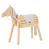 Wooden horse toy with a blanket and reins on a white background