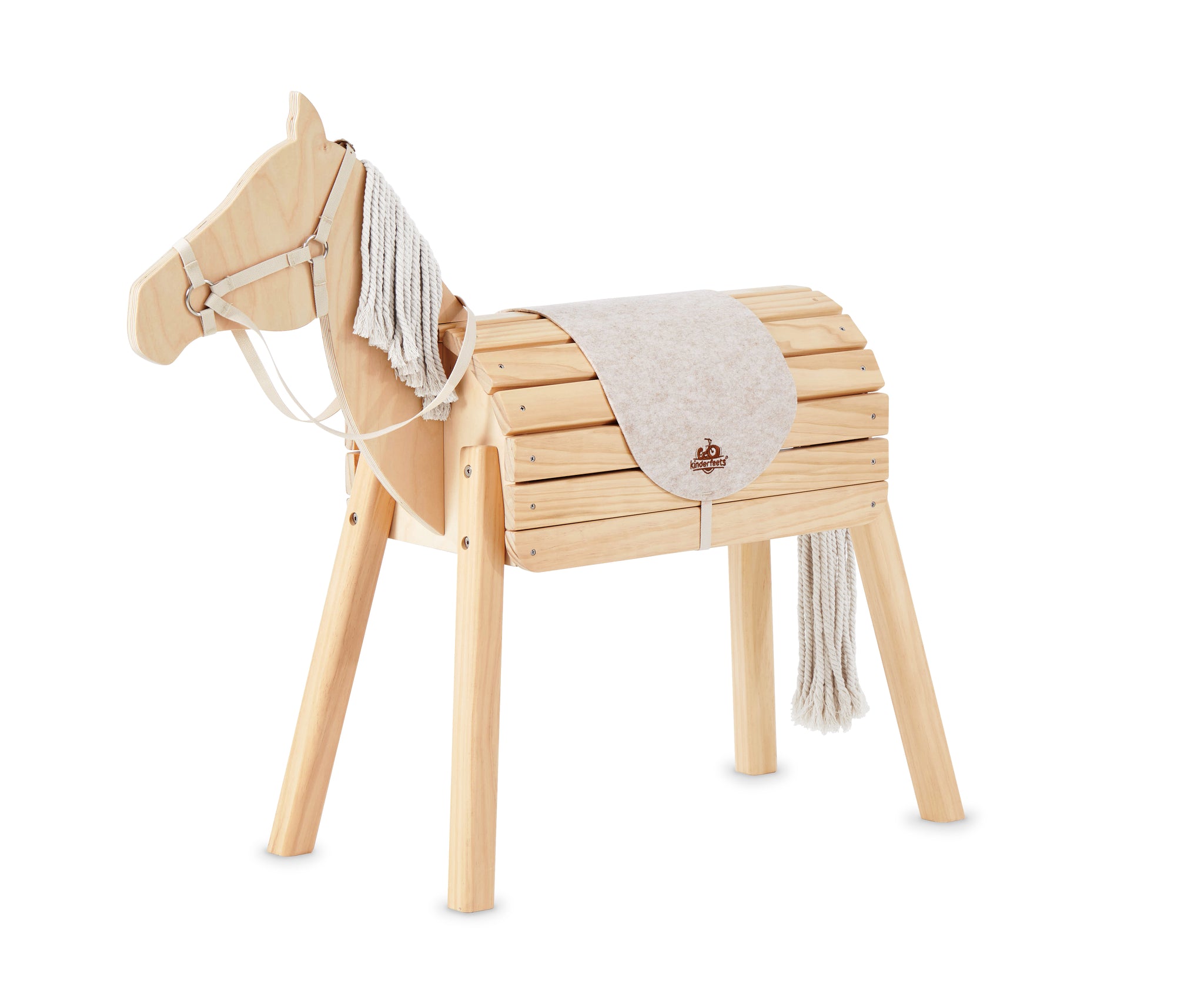 Wooden horse toy with a blanket and reins on a white background